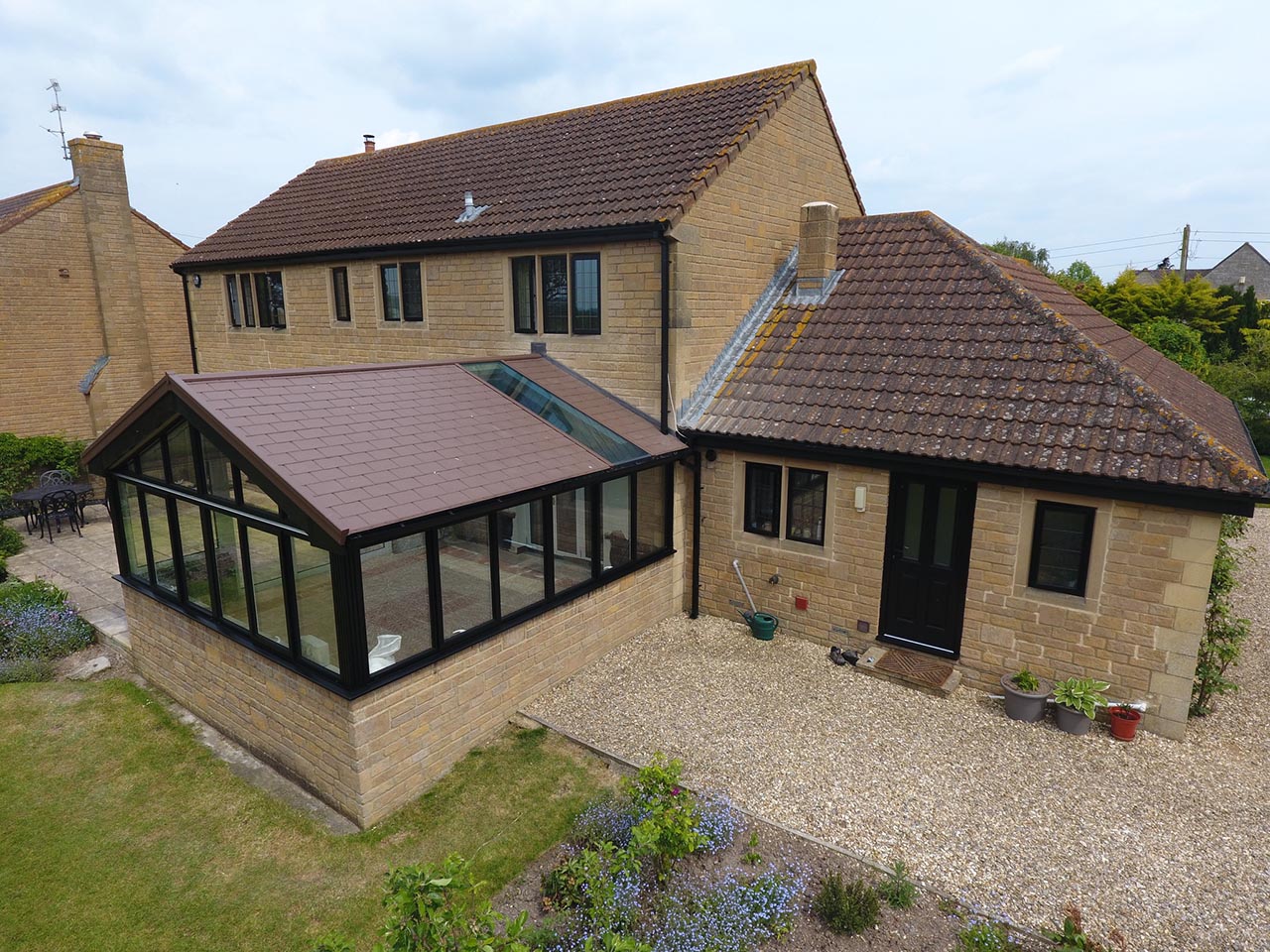 Foxtons Frames | Conservatories | Orangeries | Extensions | Replacement Roof Systems | Tinted Self-Clean Glass Roofs | Windows & Doors | Garden Rooms